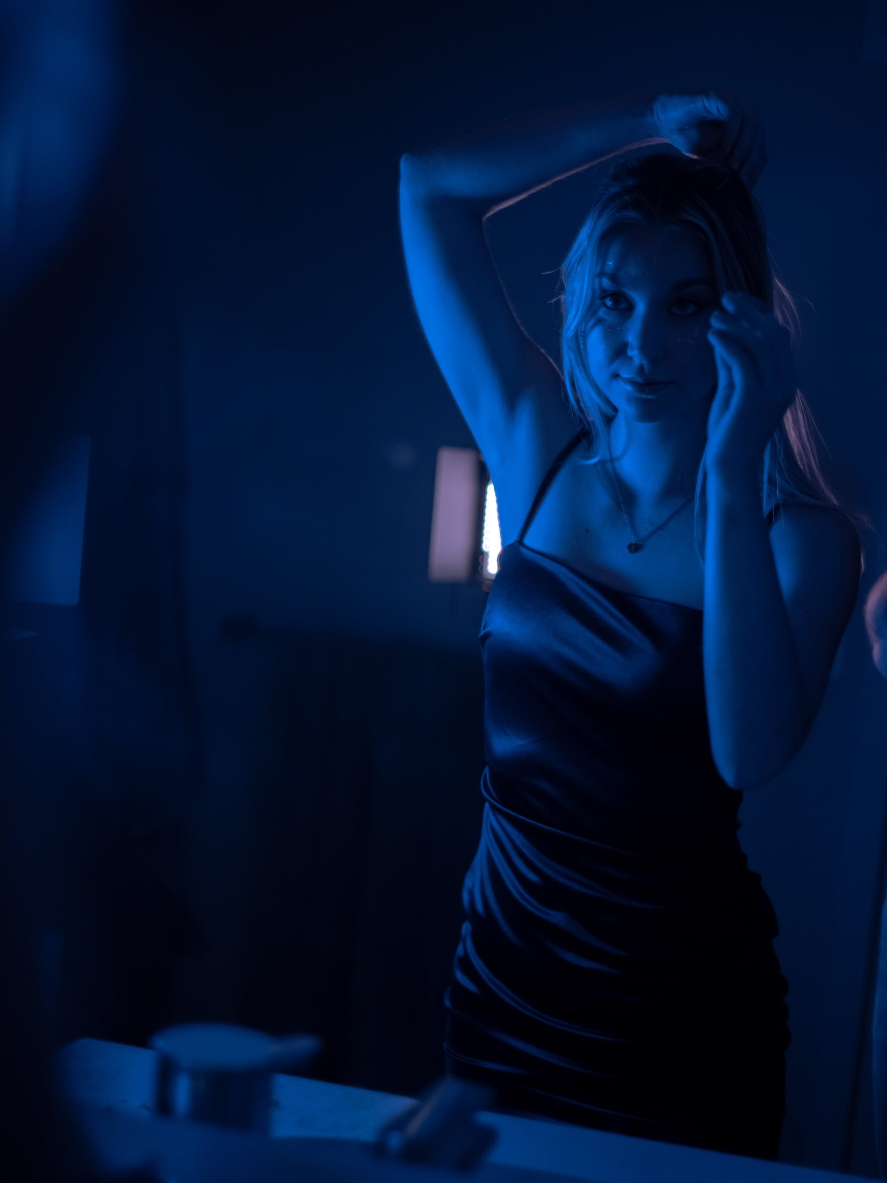 Editorial Euphoria-inspired portrait with bold colored lighting cover